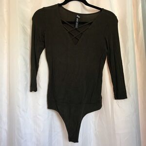 Army green bodysuit with cross ties on front